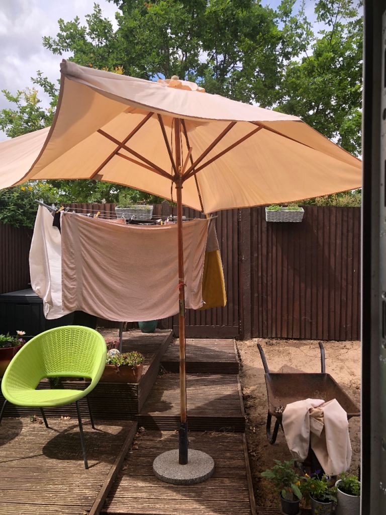 Large beige garden parasol