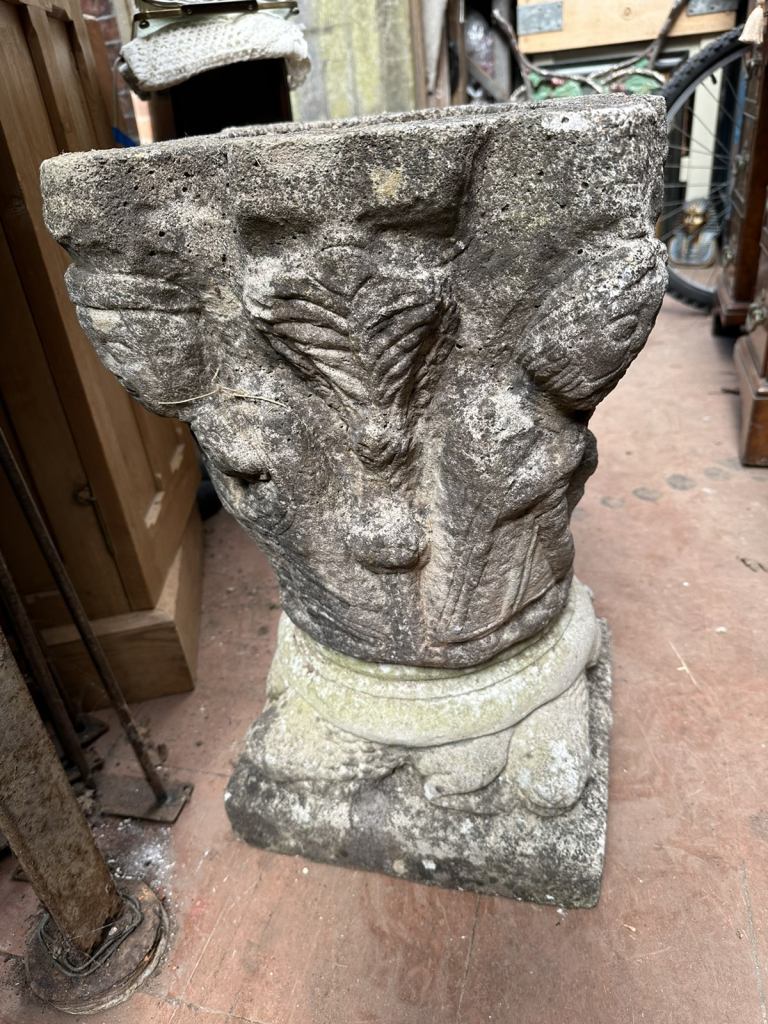 Old stone antique  bird bath.   