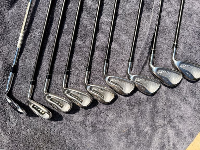 Reduced Scotty Cameron putter Taylor Made Irons and King Cobra woods- All in excellent Condition.