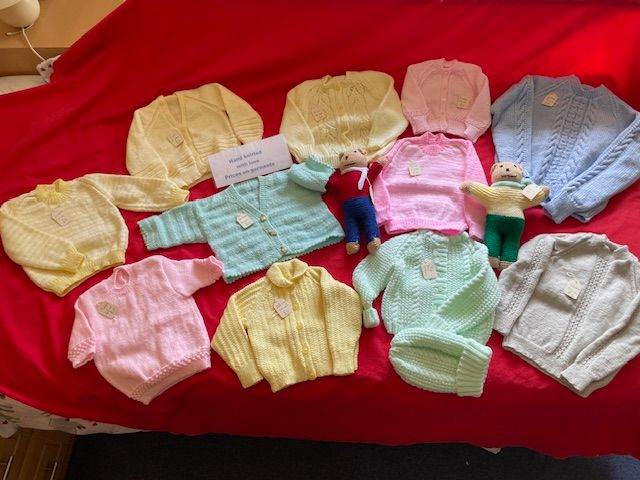 Job lot of NEW hand knitted jumpers and cardigans. Baby sizes . See photos 