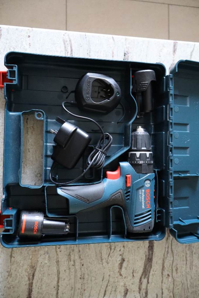 Bosch cordless drill/driver 12v as new condition -very little use inc 2 lithium batteries + charger