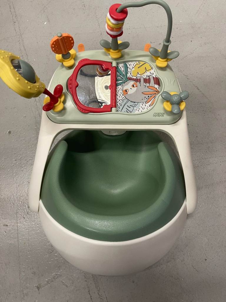 Mamas and Papas baby booster seat.