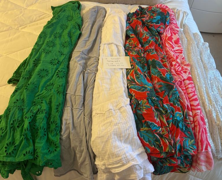 large bundle of women’s summer clothing 