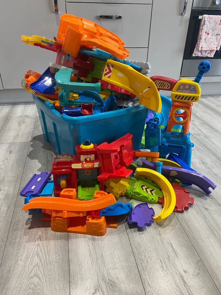 Box of toot toot track, cars and stations