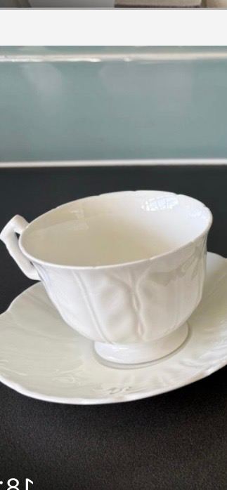 12 white fine china cups and sauces