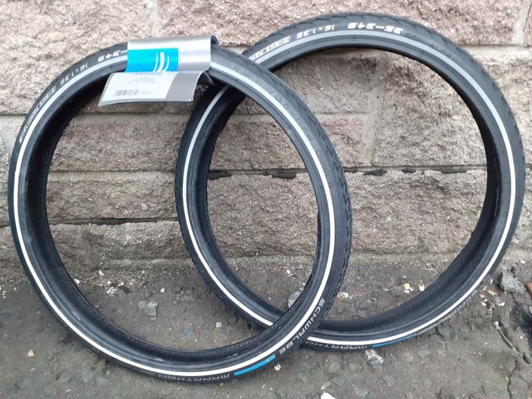 Two 16" Schwalbe Marathon Tyres with Green Guard.
