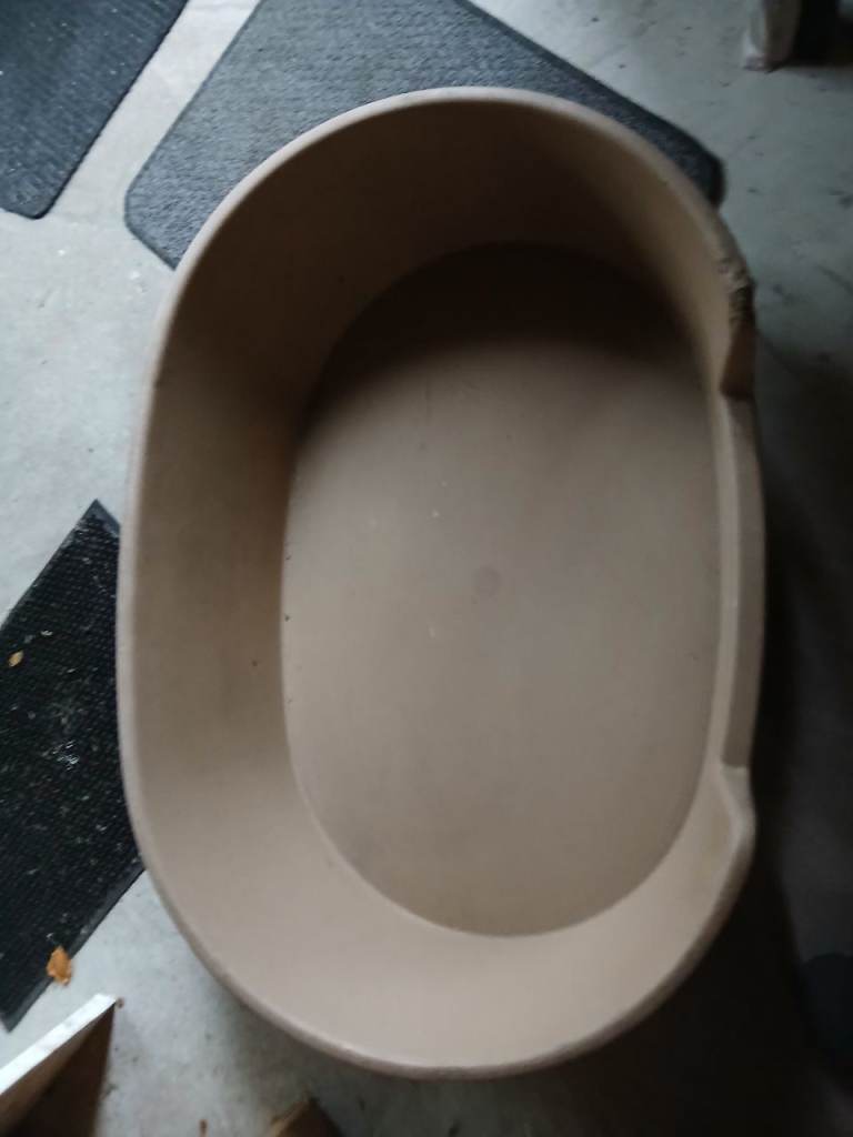 FREE- LARGE PLASTIC DOG BED
