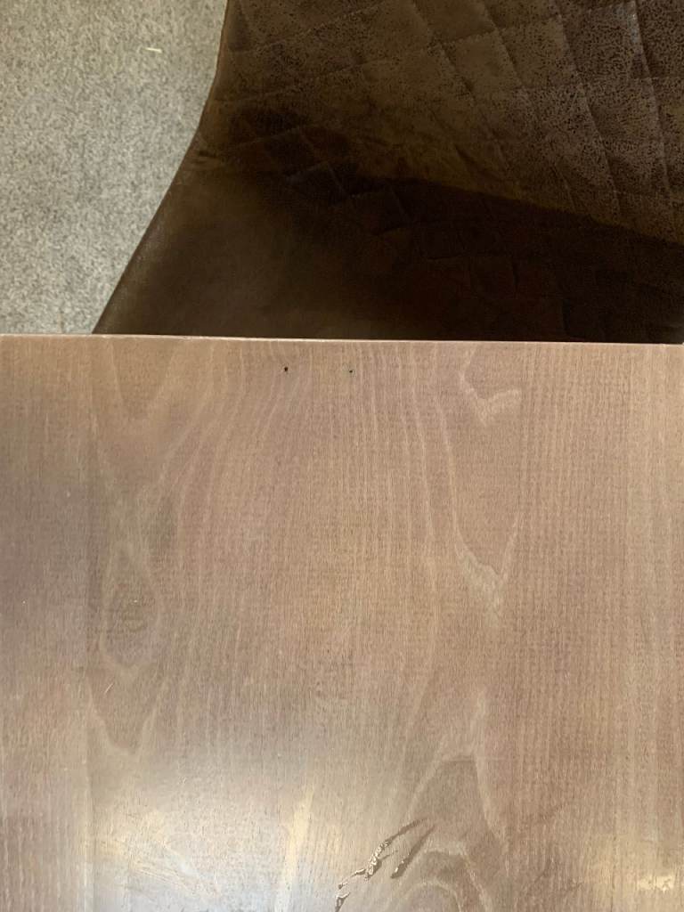 Bistro Dining Table with two Chairs, featuring Square Brown Faux-Suede Seats .