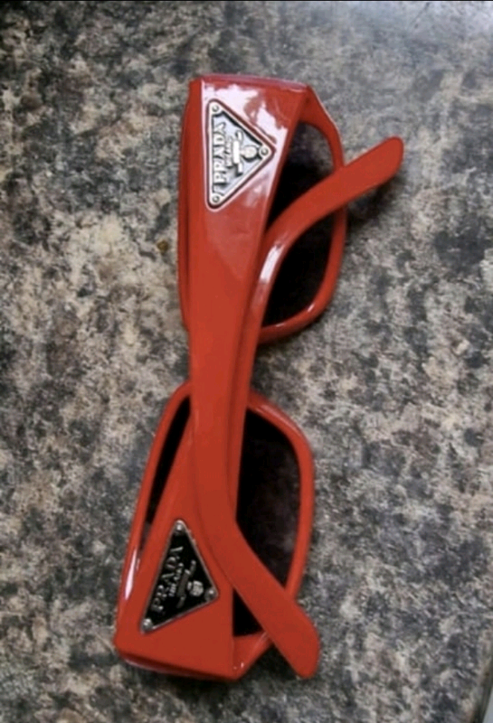 Prada red polarised sunglasses