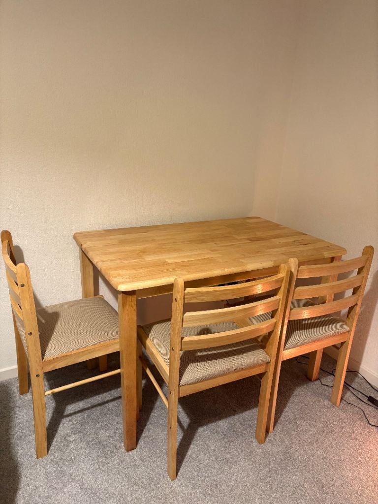 image for Light Wooden Table and Three Chairs 