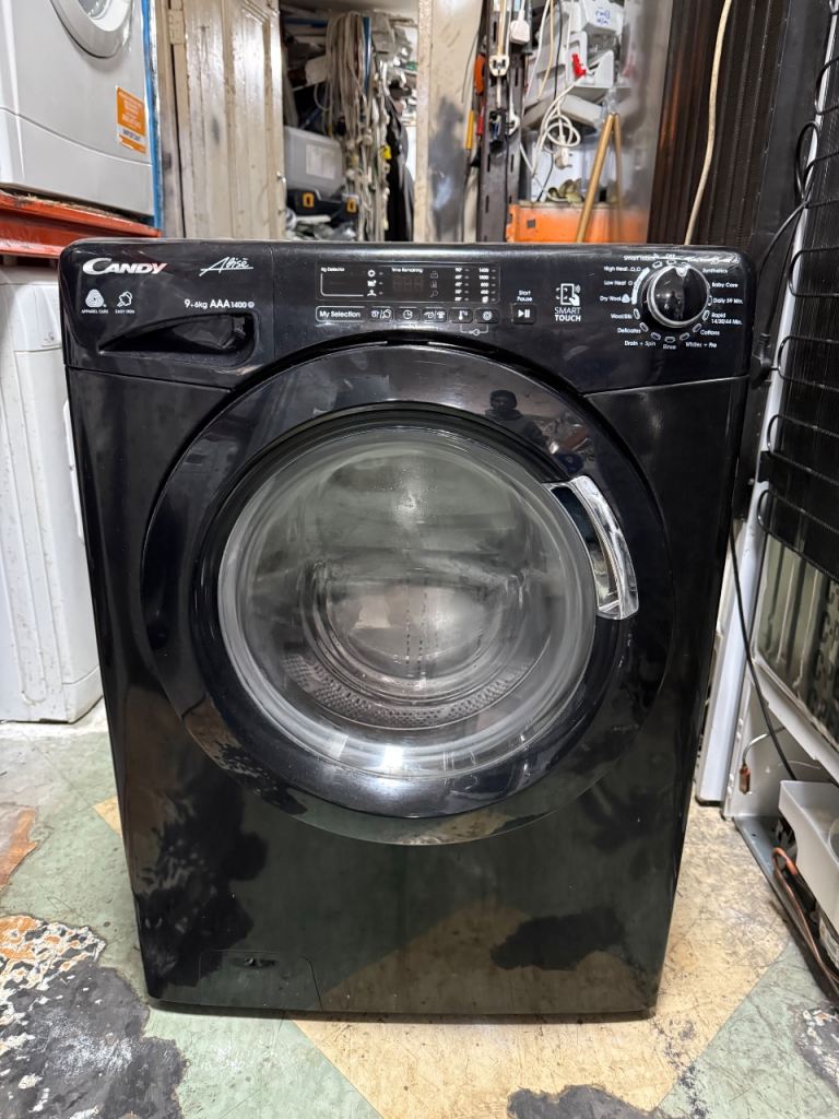 Candy washer dryer 9+6 kg very nice neat and clean beautiful condition 