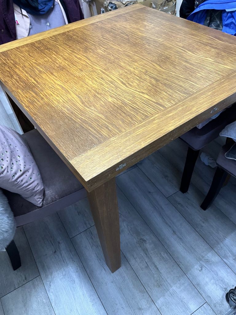 Oak extending table and 4 chairs