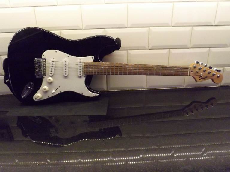 Fender Squier Strato' Electric Guitar with Amp. sling and cable