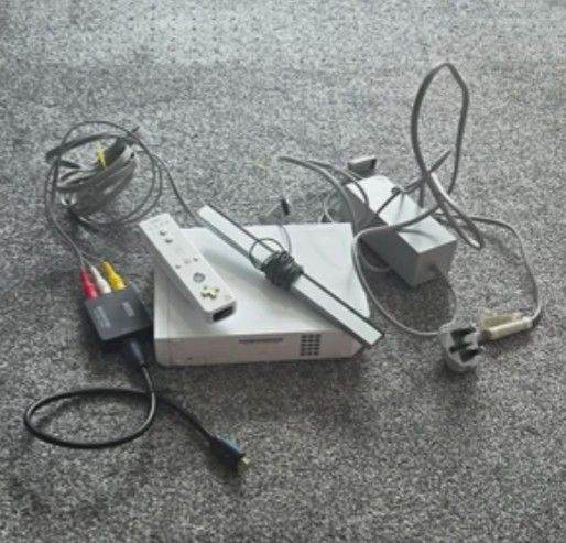 Nintendo Wii + Accessories + Games