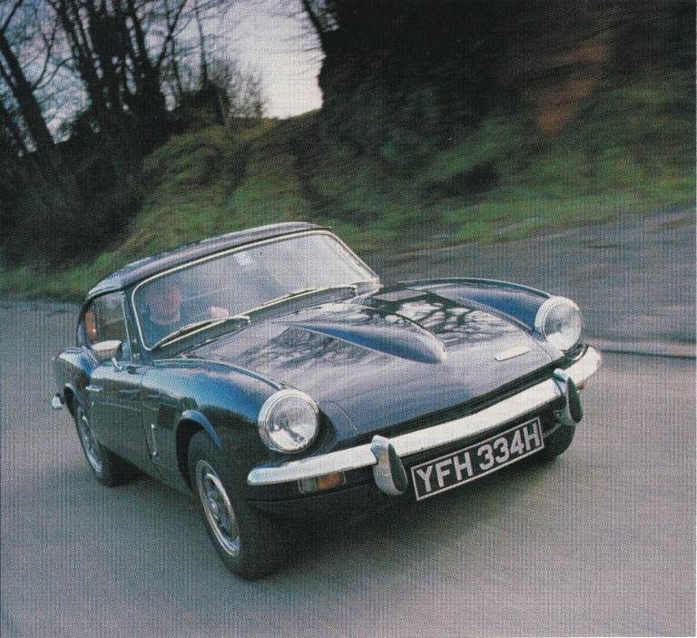 11. A Rare Original Magazine Advertisement of a Triumph GT6