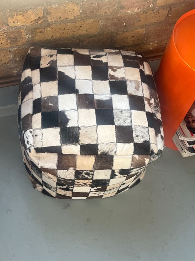Authentic cow hide puff / foot stool