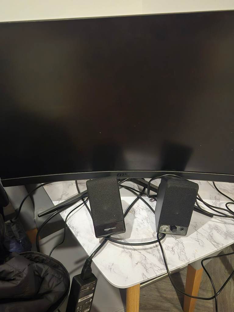 image for 28 inch curved games monitor with speakers and headset