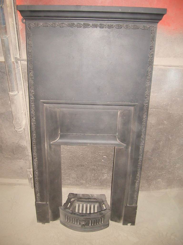 Small bedroom style cast iron fireplace