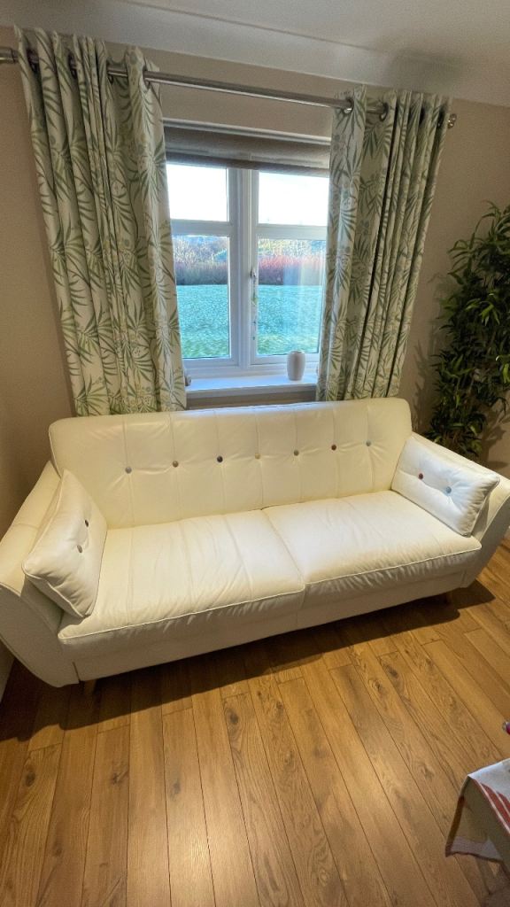 3 seater leather sofa and matching footstool. 