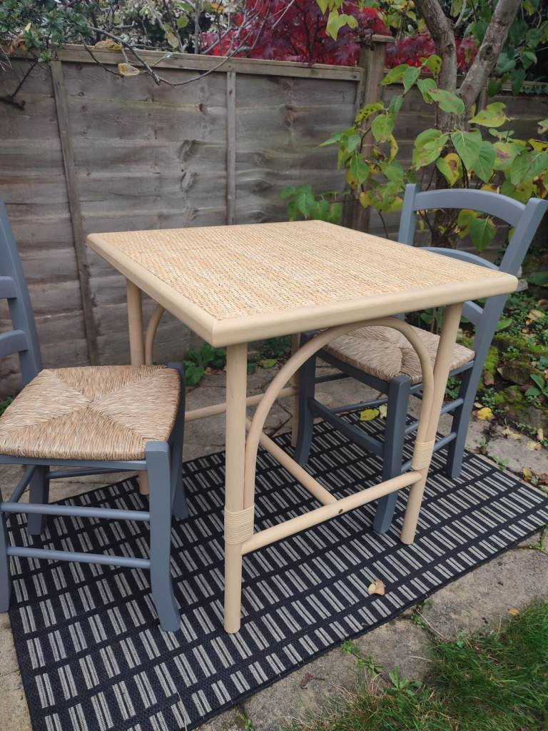 A cane and rubberwood bistro table for 2 from La Redoute