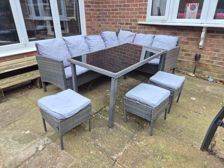 Rattan garden corner set includes table, 3 stools and all cushions, delivery available 