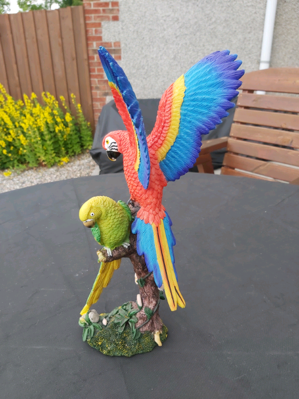 Two Parakeets on a tree ornament