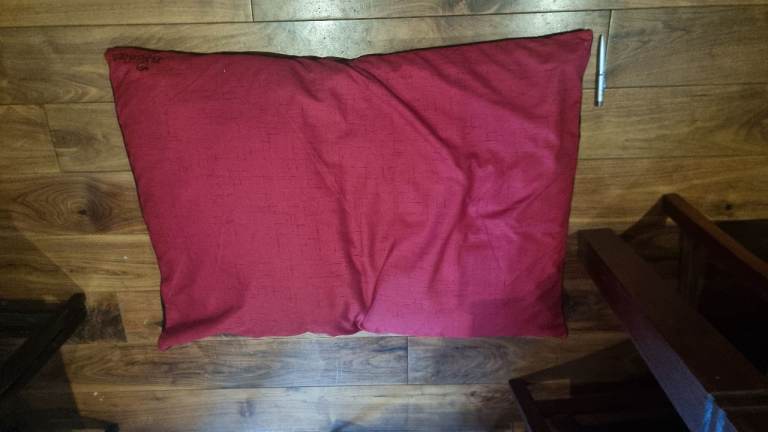 Two large red cushions