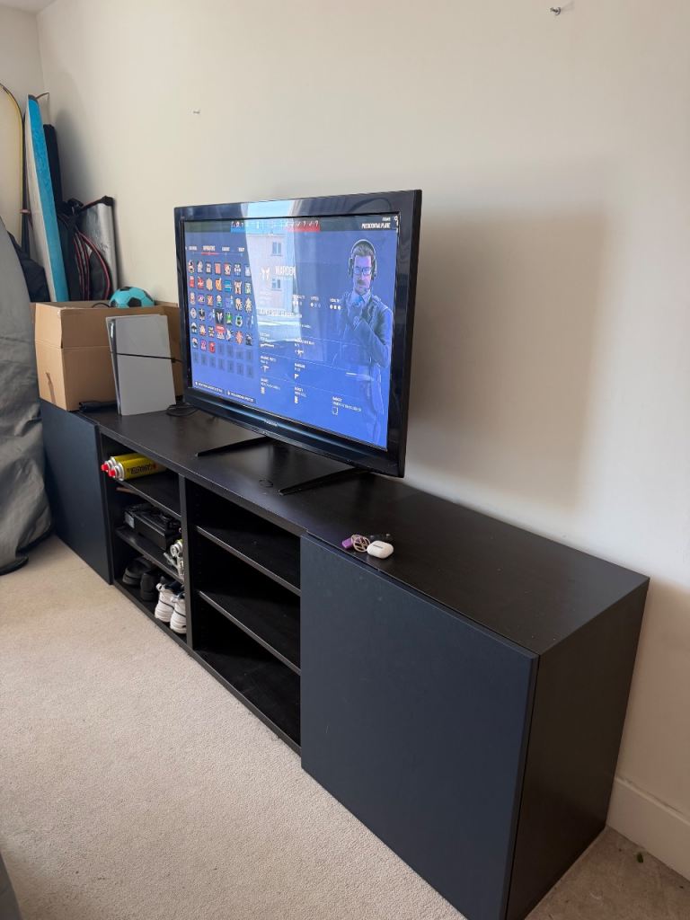 Black and navy TV Unit and storage plus two bedside tables 