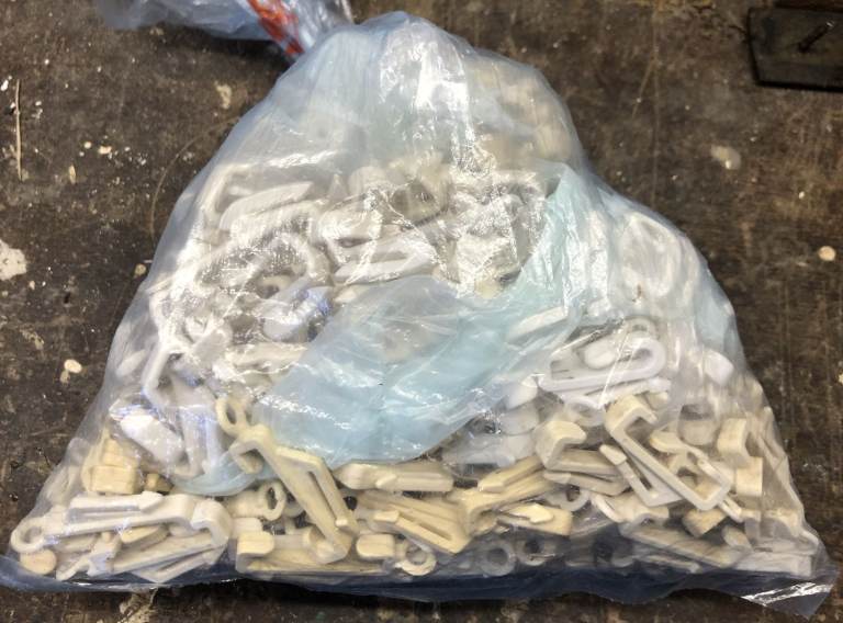 4 piles of 4 types of curtain hooks, as per photos, for SWISH, DRAPE etc plus attachments