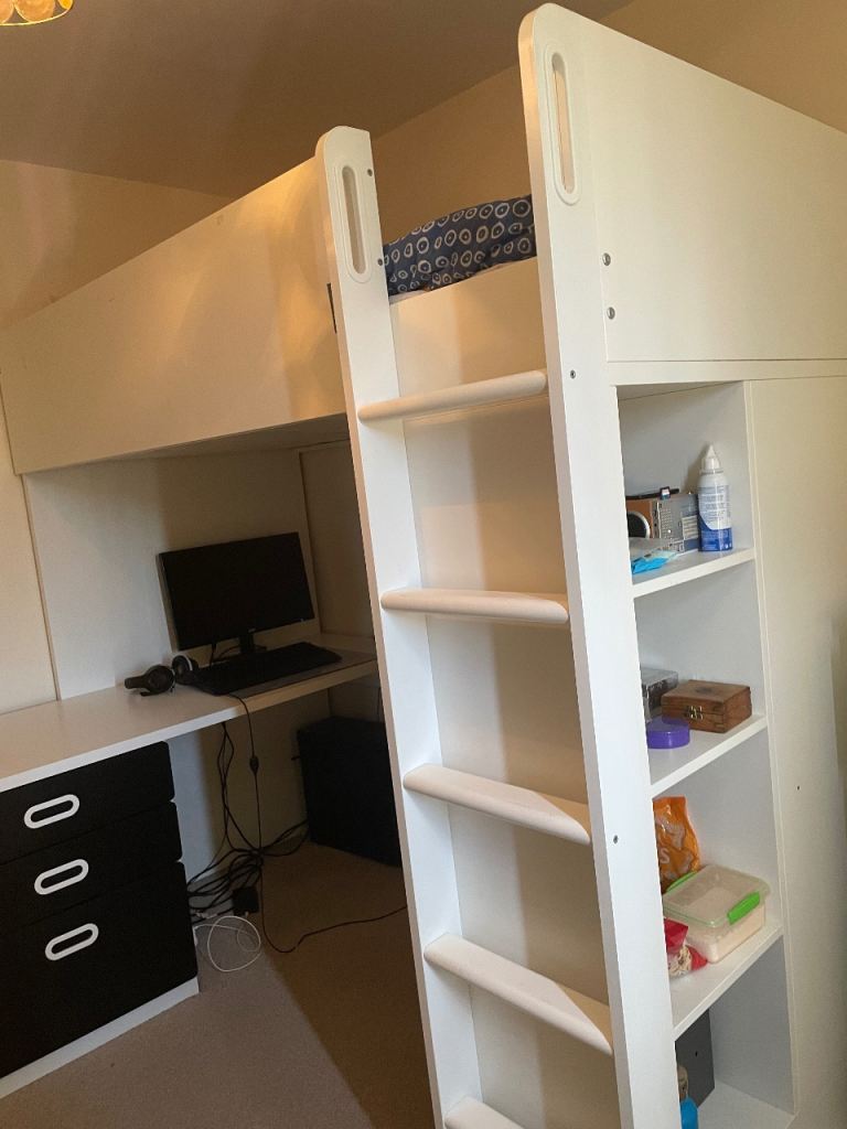 High sleeper with wardrobe desk and shelves attached 