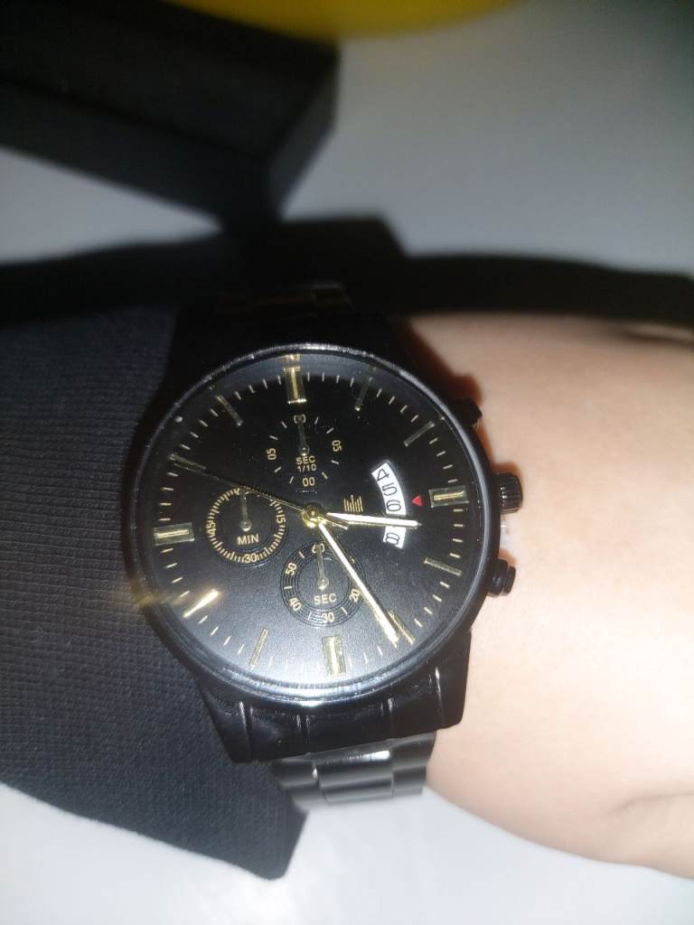 Black and gold watch