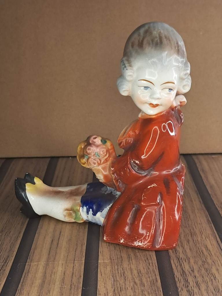 Vintage Goebel Hummel figurine, specifically a TMK-1 Incised Crown Mark XS shelf sitter. 