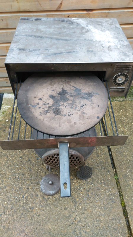 free loc del. chimenea chiminea cast iron wood charcoal 12''pizza oven