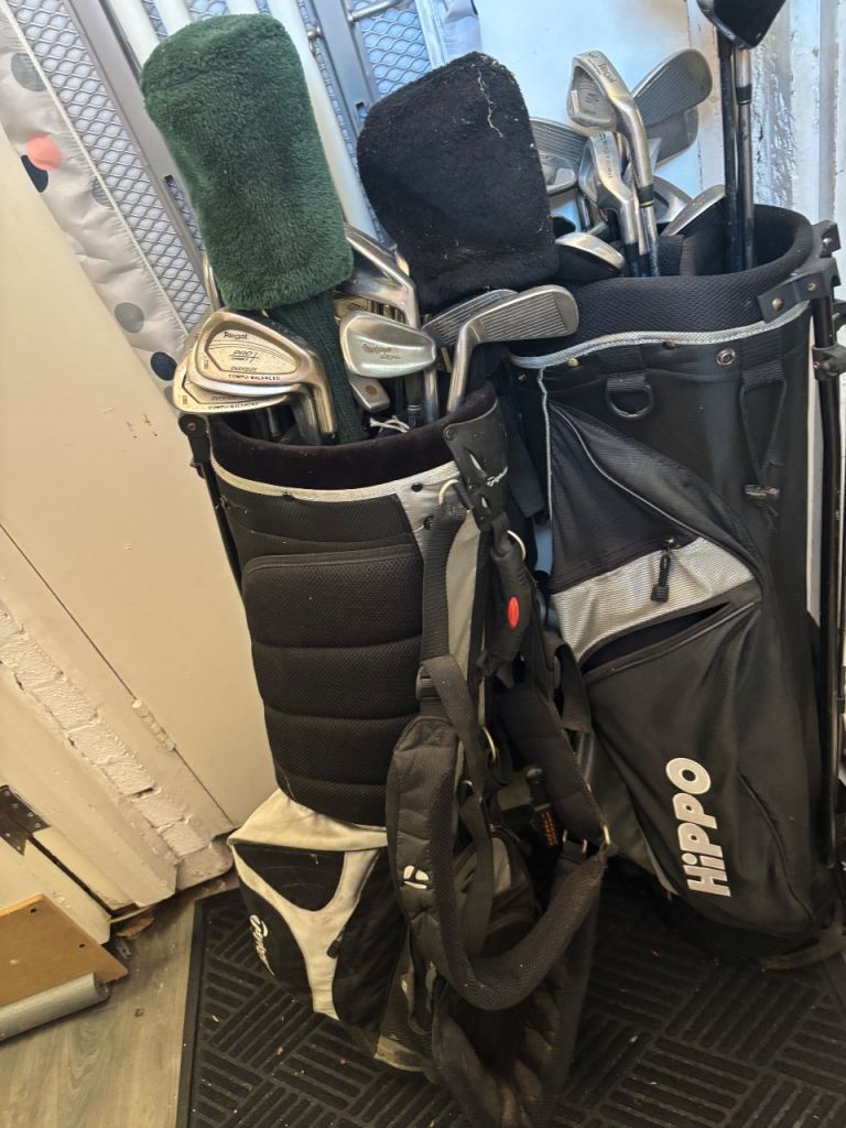 2sets of golf clubs with stand bags 