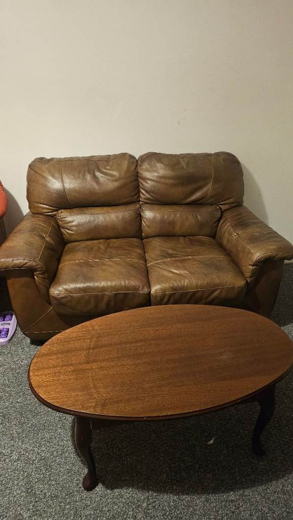 Leather sofa with coffee table