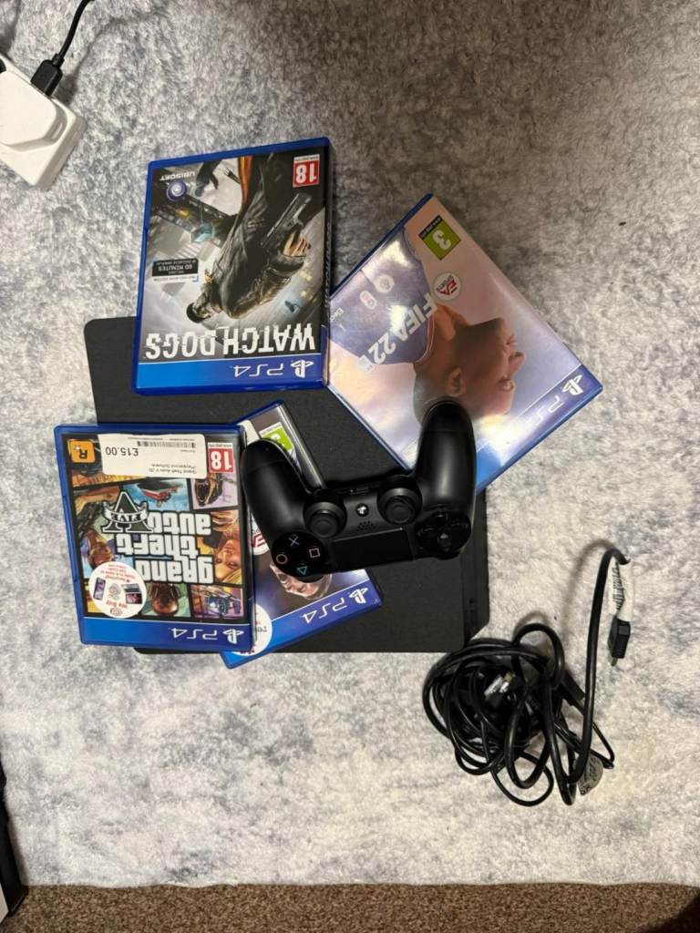 PS4 slim with 4 games one controller 