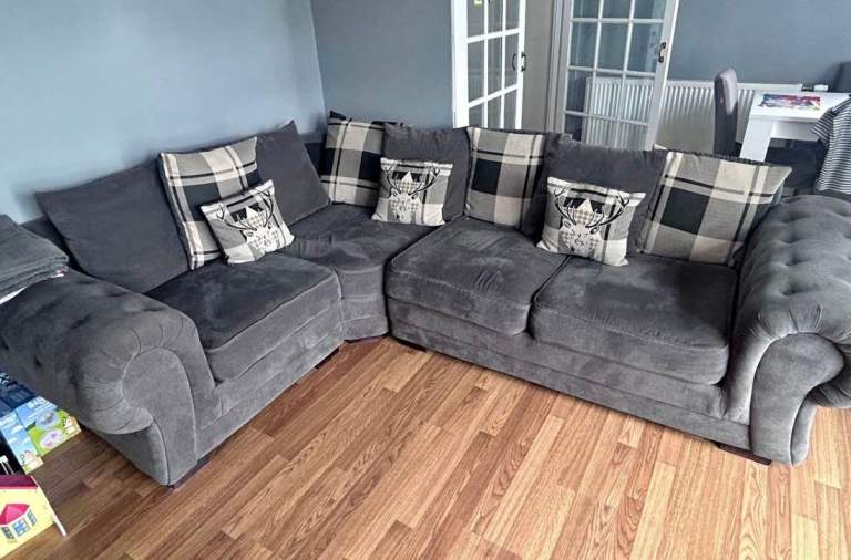 Grey Corner Sofa with Tartan Cushions – Good Condition