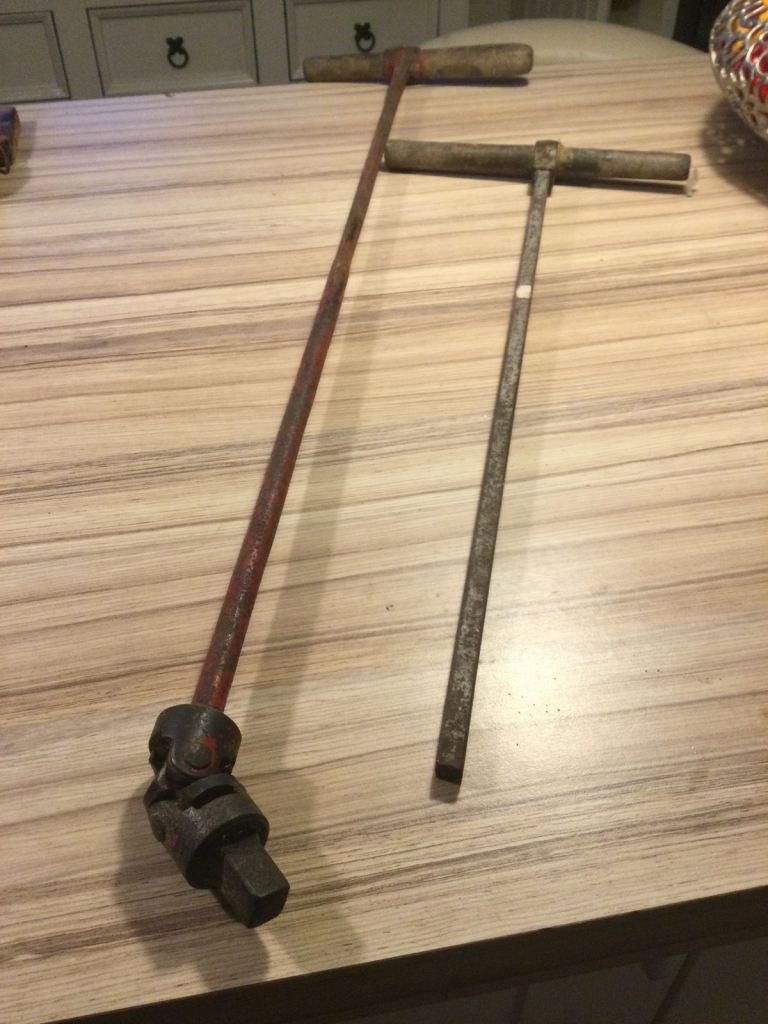 Vintage car jack  handles.
