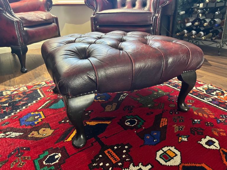 Oxblood red leather Chesterfield buttoned footstool  