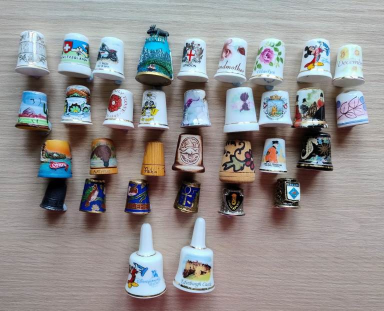For sale 31 Thimbles  & 2 bells all £1 each.