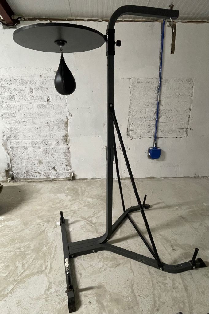 Freestanding punching bag stand with speed ball 