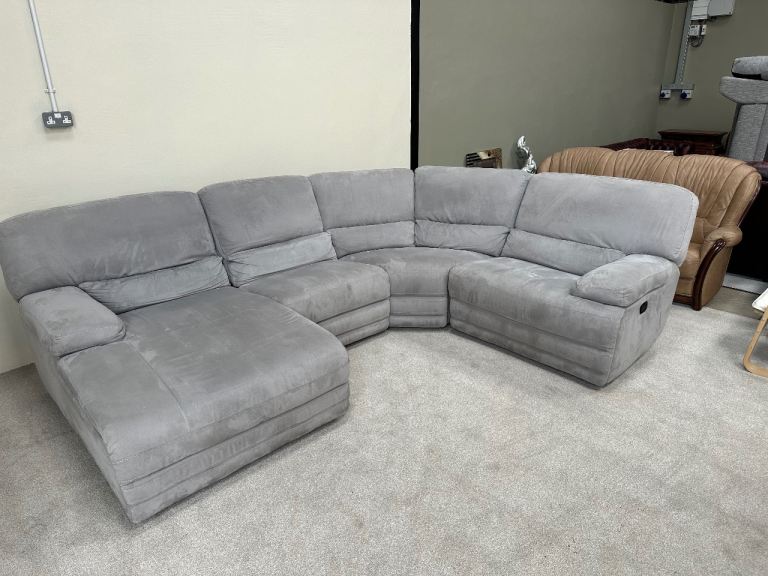 Grey fabric corner sofa with manual recliner & chaise end 