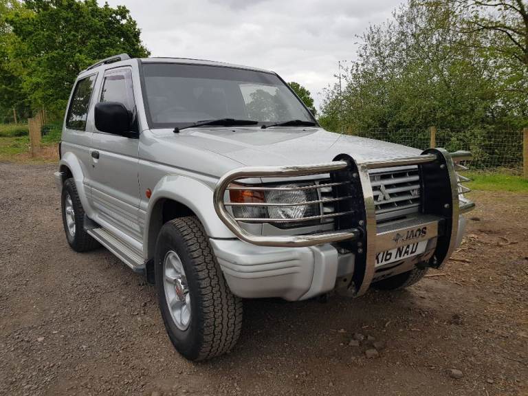Mitsubishi shogun Pajero alloy wheels with new tyres 15 inch X4