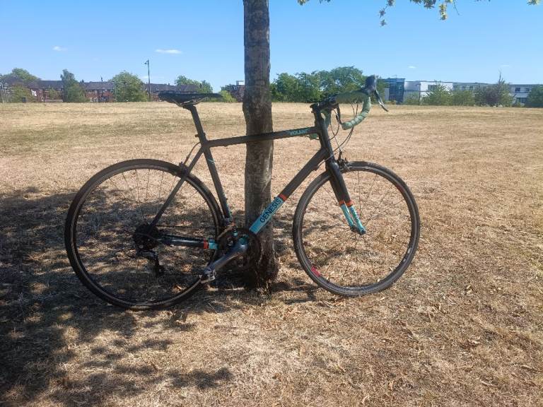 Road Bike - Black Frame, Teal Accents, Good Condition