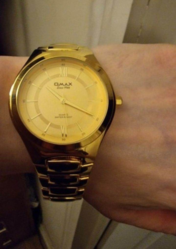 Gold tone watch