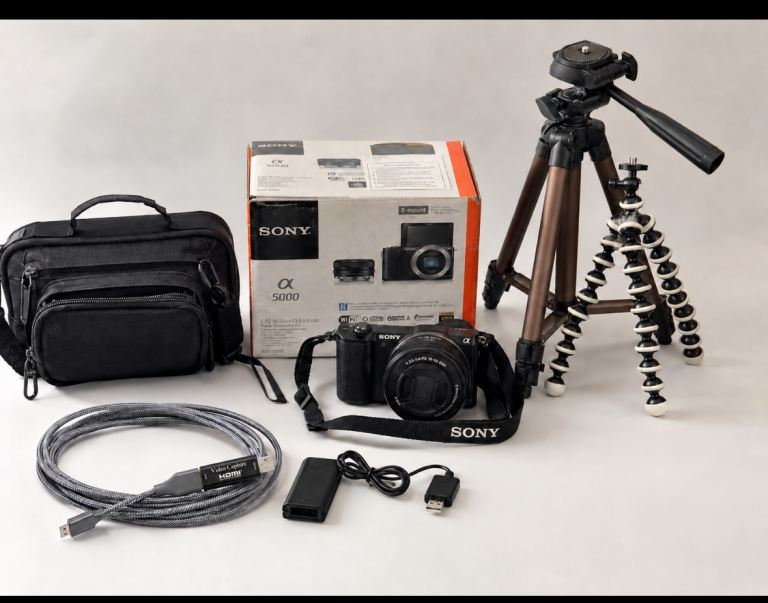 Sony a5000 Mirrorless Camera Kit with Lenses, Tripods, and Bag