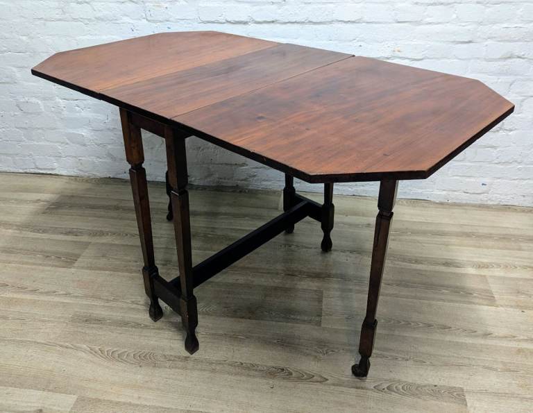 Edwardian mahogany octagonal drop leaf dining table 