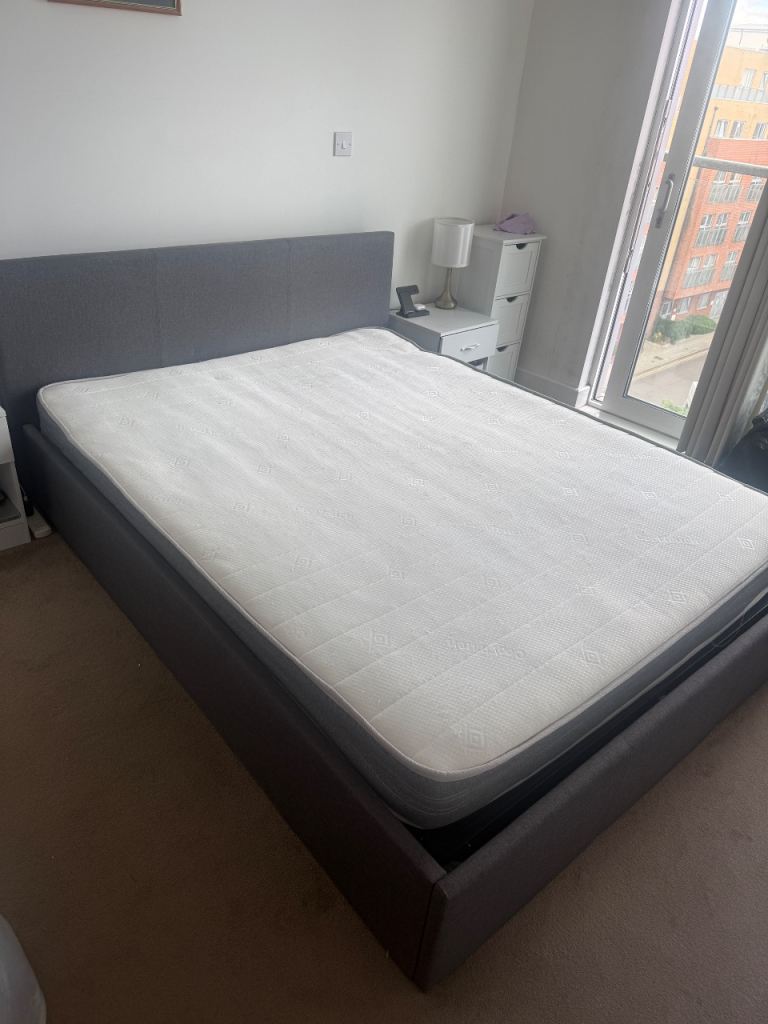 Grey kingsize upholstered ottoman storage bed and mattress