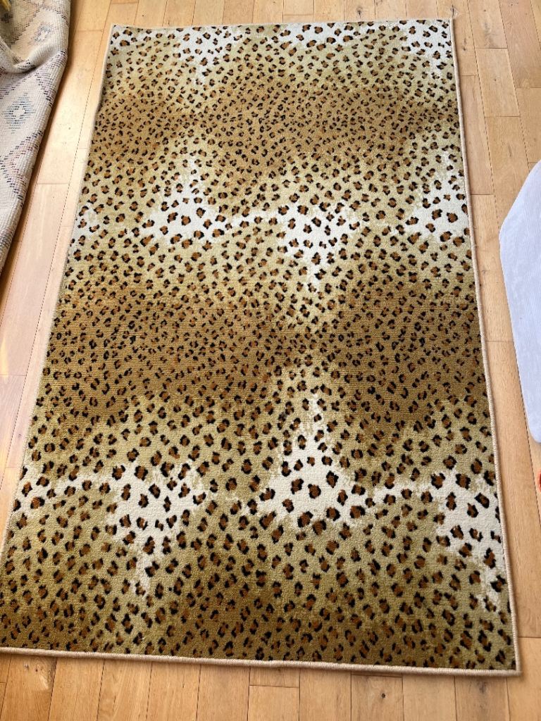 Synthetic wool leopard print rug 