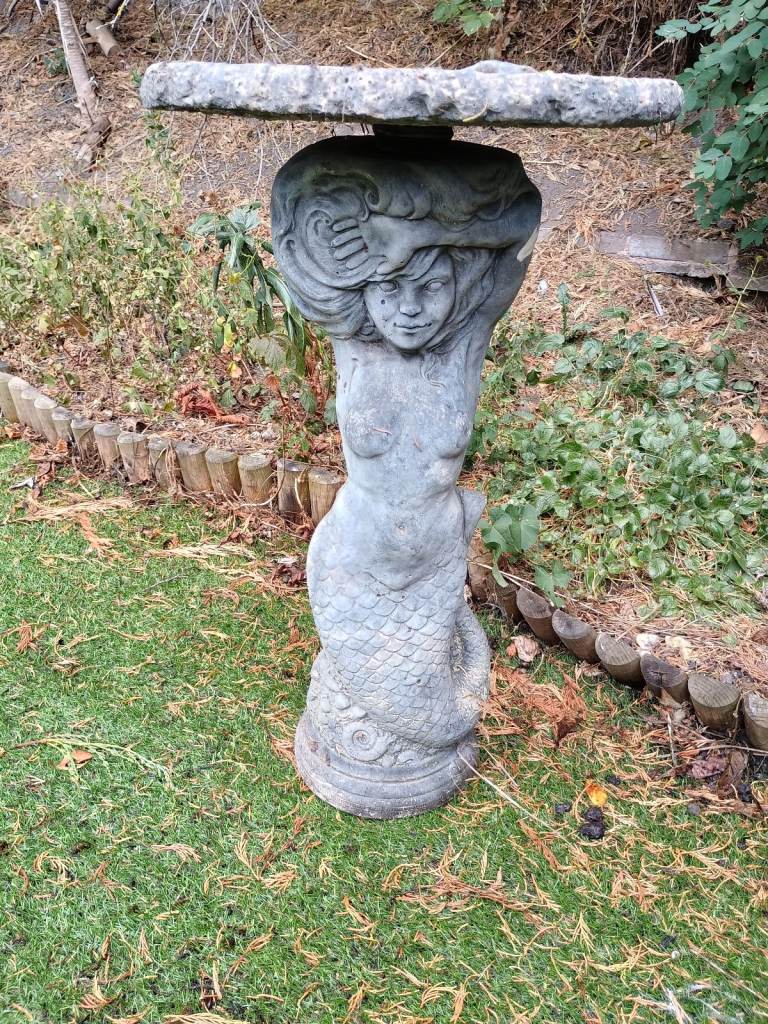 Stone garden pedestal/bird bath.
